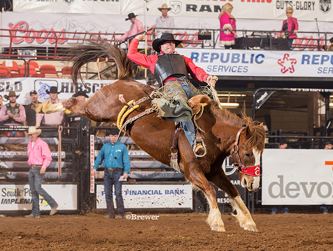 Jesse Bail, a 12-time Wrangler National Finals Rodeo qualifier from Camp Crook, S.D., rides Pete Carr’s Classic Pro Rodeo for 82.5 points to move into a tie for fifth place in the opening round at the San Angelo Stock Show and Rodeo. That secures him for Friday’s short go-round and gives him a shot at his third San Angelo title. (PHOTO BY TODD BREWER)