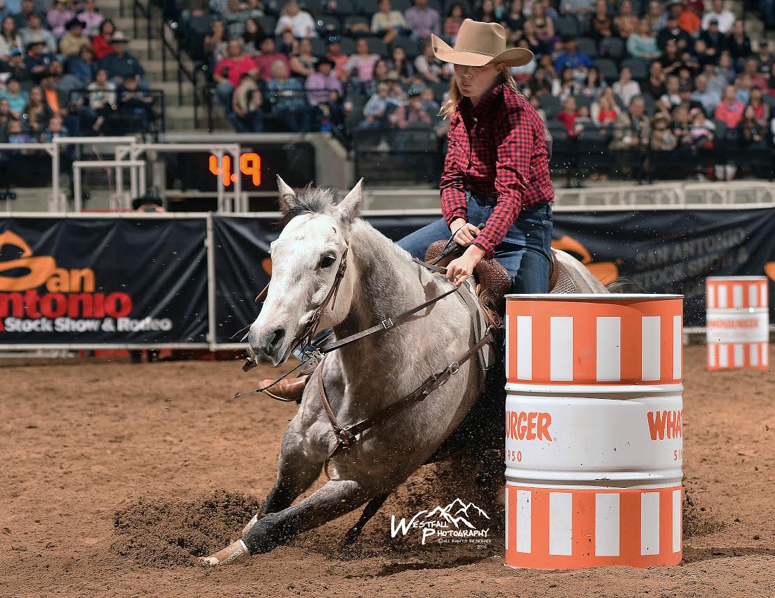 Brittany Kelly, Dugan’s wife won the round in the barrel racing riding her nine-year-old gelding Possum. Photo by Greg Westfall
