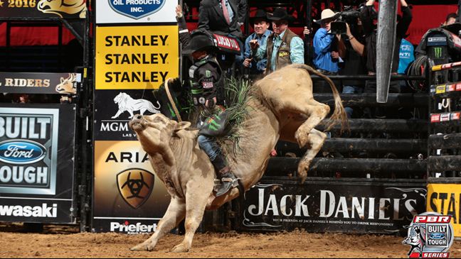 J.B. Mauney rides Sheep Creek for 90.25 points. Photo by Andy Watson / BullStockMedia.com.