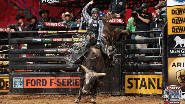 Nevada Newman rides Ante Up for 88.25 points. Photo by Andy Watson / BullStockMedia.com.