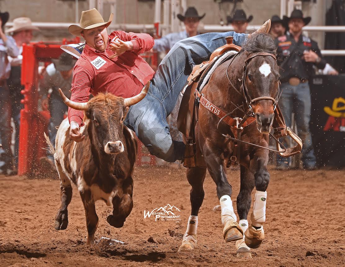 A 4.3-second run in the steer wrestling earned Tooter Silver the most money of any contestant in semifinals 2 at the San Antonio Stock Show Rodeo. The Quitman, Ark., resident will compete in Saturday night’s championship finals having already won $12,617. – San Antonio Stock Show Rodeo photo by Greg Westfall.
