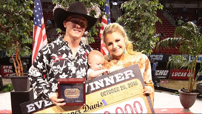 Cooper Davis with his son, Mack, and wife, Kaitlyn, at the 2015 World Finals.