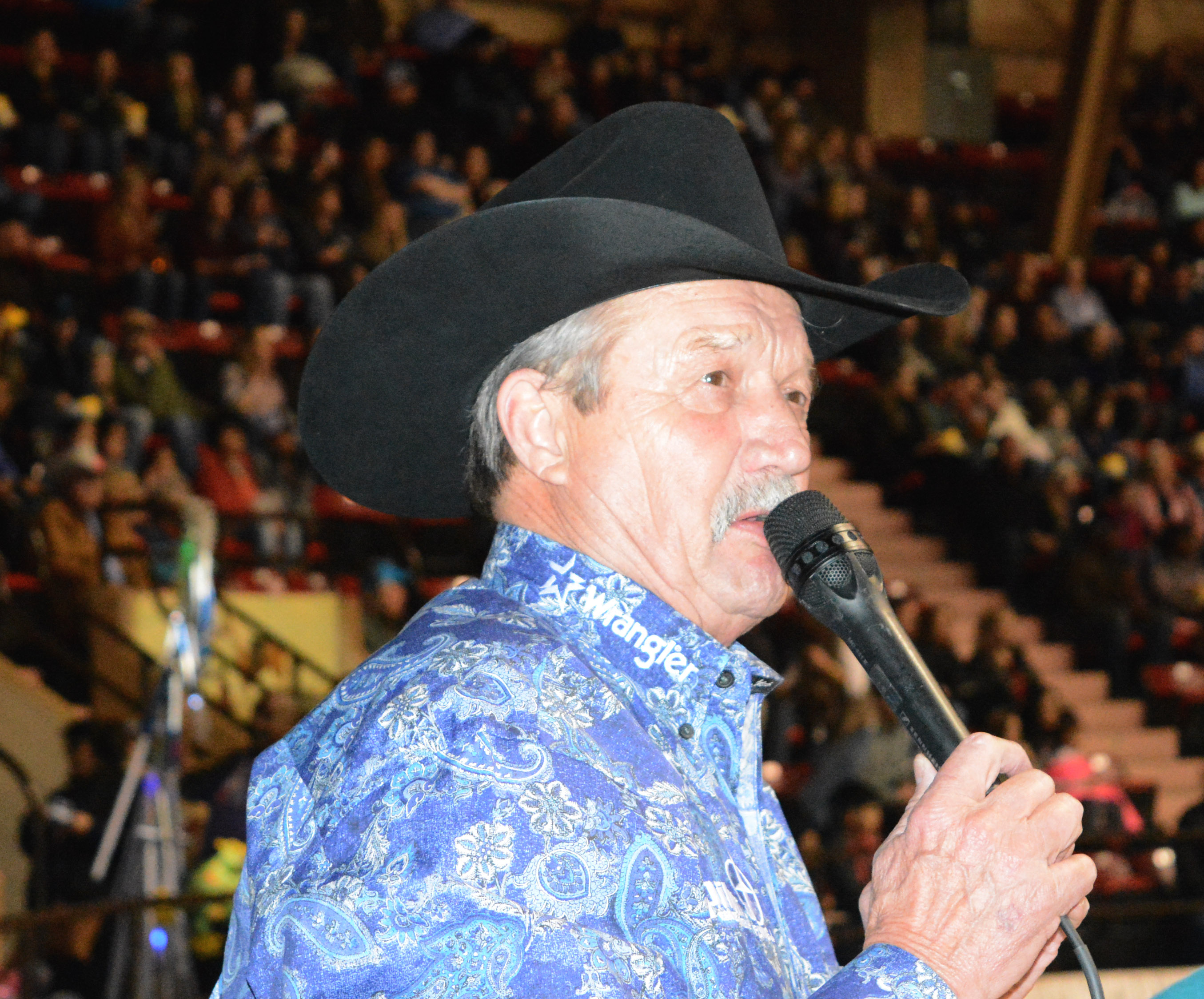 Legendary rodeo announcer Bob Tallman calls the action along with Doug Mathis at the Fort Worth Stock Show & Rodeo.
