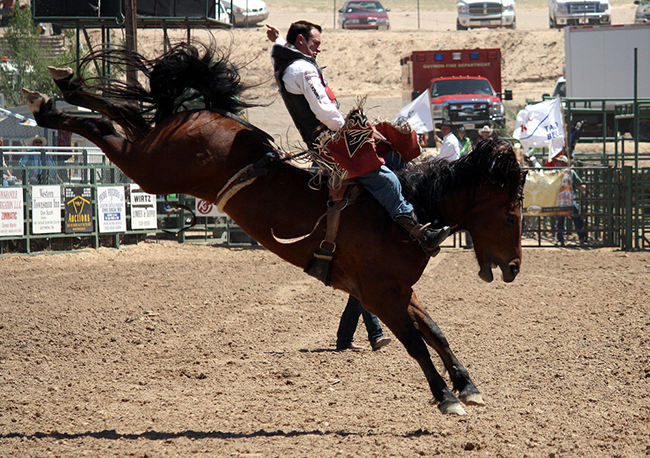 Three-time Wrangler National Finals Rodeo qualifier Matt Bright rides the famed Dirty Jacket to win the title at the 2011 Guymon (Okla.) Pioneer Days Rodeo. Four cowboys have won the Guymon title on the back of Dirty Jacket, the 2014-15 Bareback Horse of the Year.