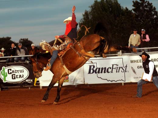 Clay Elliott claimed the Saddle Bronc Riding title this past weekend at the Southwestern Oklahoma State University Rodeo in Weatherford, Okla. —Photo by Dale Hirschman
