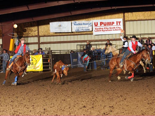 Brothers Ben and Nathan Johnsrud of Plains, Kan. captured the title in the team roping at the Garden City Community College Rodeo. —Photo by Dale Hirschman