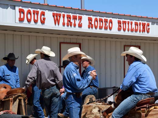 Billy Etbauer works with a student at the 2016 edition of the Deke Latham Memorial Bronc Riding School. —Photo by Danae Moore