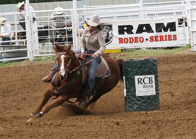 NFR qualifier Jean Winters of Texline, Texas, rounds the second barrel during a recent competition of the Will Rogers stampede. The 2016 edition of the award-winning rodeo will take place next week in Claremore, Okla.