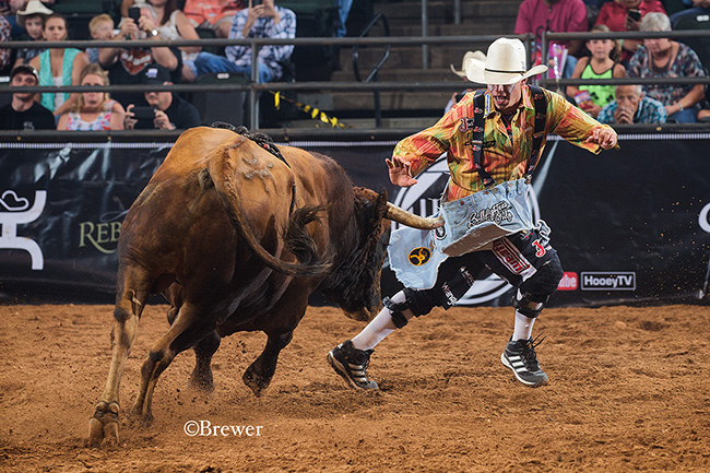 Cody Webster matches moves with his fighting bull for 88.5 points to win the inaugural Bullfighters Only Cavender’s Cup in Cedar Park, Texas. (TODD BREWER PHOTO)
