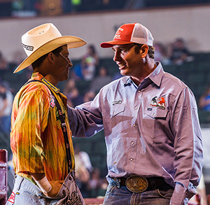 Cody Webster, left, and Evan Allard discuss a Bullfighters Only competition recently. Not only will the two men be part of Sidney’s contest, they will work in protection during the rodeo. (TODD BREWER PHOTO)
