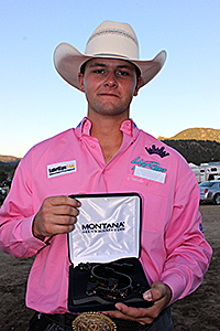 Dustin Egusquiza shows off his championship spurs.
