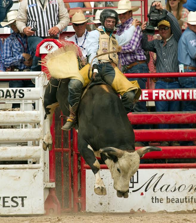 Garrett Smith scored 87 points on Rafter G Rodeo’s bull J Lazy at the 120th Cheyenne Frontier Days, tying for first in the opening round. -- CFD photo by Dan Hubbell.