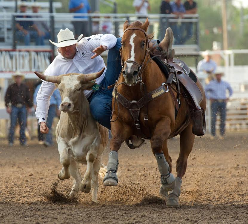 Billy Bugenig from Ferndale, Calif., took the overall lead in steer wrestling at the “Daddy of ‘em All” on Tuesday. He has a total time of 17.2 on two runs. -- CFD photo by Dan Hubbell.