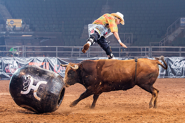 Cody Webster jumps a bull during his victory earlier this year in Cedar Park, Texas. Webster will be one of the men battling for the Bullfighters Only title next week during the opening night of the Caldwell Night Rodeo. (TODD BREWER PHOTO)