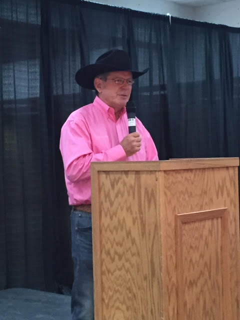 Rodeo President Mike Scarr is Tough Enough to Wear Pink as he welcomes the crowd to the 2015 Toast to the Tatas event.
