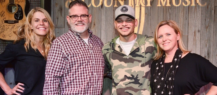 Photo L-R: Martha Earls, EFG Management; Erick Long, ACM; Kane Brown; Lisa Lee, ACM Photo Credit: Michel Bourquard/Courtesy of the Academy of Country Music