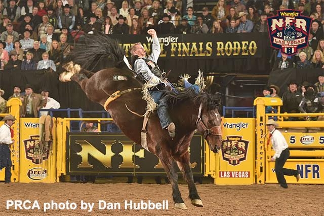 Orin Larsen - 87.5 on Frontier Rodeo’s Full Baggage - PRCA photo by Dan Hubbell