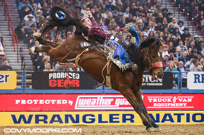 Orin Larsen rides Pete Carr Pro Rodeo’s MGM Dirty Jacket for 86.5 points to finish third in the ninth round of the Wrangler National Finals Rodeo on Friday night. He has earned more than $72,000 at the NFR. (COVY MOORE PHOTO)